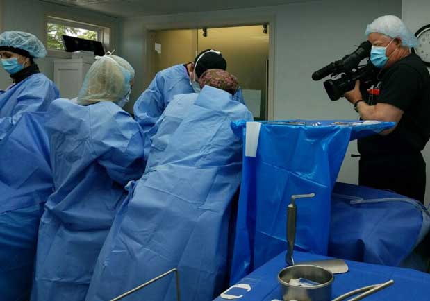 Dr. Ratliff performing surgery on patient featured on The Doctors